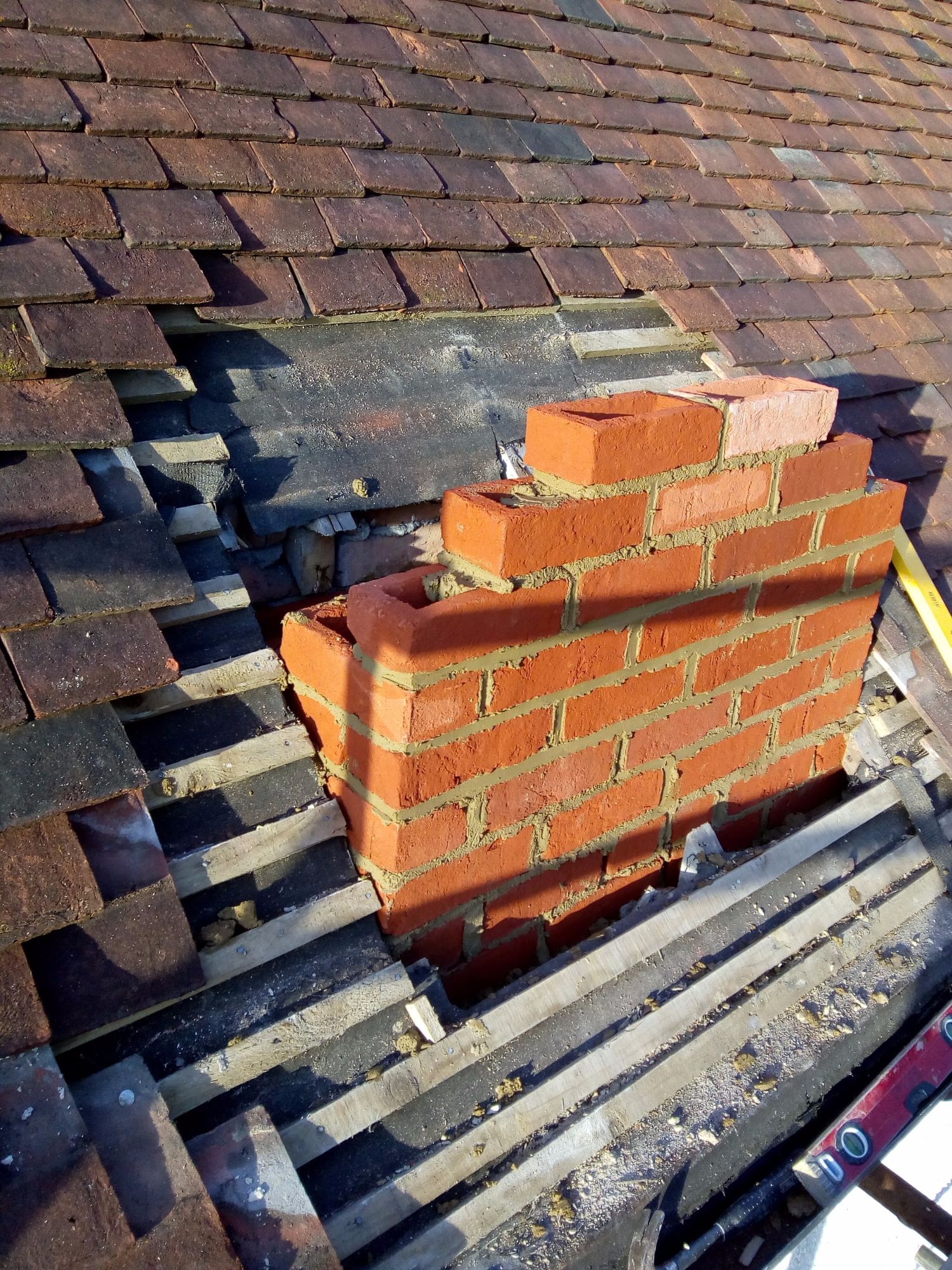 Brickwork, chimneys and roofing